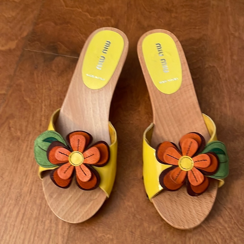 Miu Miu wooden sandal with leather floral detail